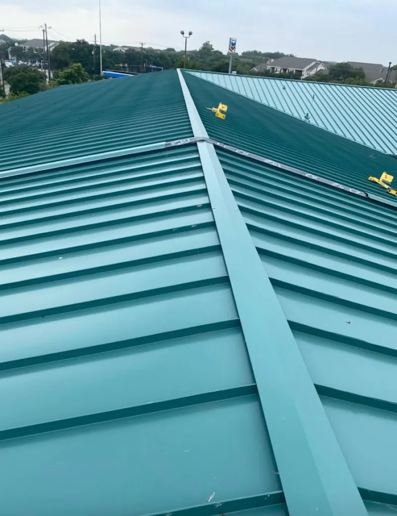 Green commercial metal roof ridge and valley for Metal Roof Repair in Howell