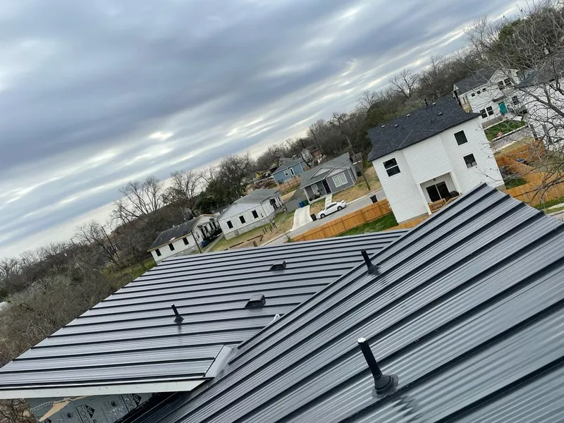 Standing seam metal roof panels with vents for Skylight Repair in Howell